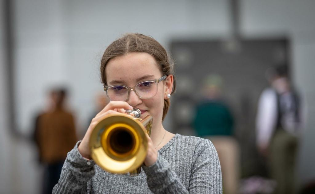 Lauren playing taps